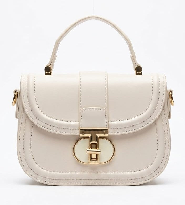 Cream curved flap top handle bag